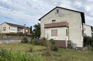 Haus kaufen in 35418 Buseck, Buseck - Großes Zweifamilienhaus mit Garten in Alten-Buseck