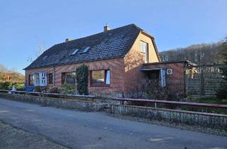 Einfamilienhaus kaufen in 24405 Mohrkirch, Mohrkirch - Einfamilienhaus mit Einliegerwohnung und Baugrundstück