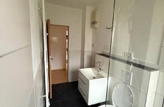 Wohnung kaufen in 65474 Bischofsheim, Bischofsheim - Helle 3-Zimmer-Wohnung mit modernisiertem Bad in Bischofsheim