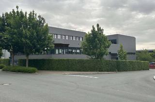 Gewerbeimmobilie kaufen in 59439 Holzwickede, Büro- und Verwaltungsgebäude mit vielseitig nutzbarem Lager