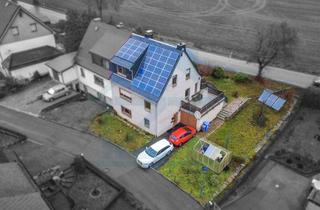 Doppelhaushälfte kaufen in 07356 Bad Lobenstein, Vielseitige Doppelhaushälfte mit Terrasse, Garage und separatem Nutzbereich