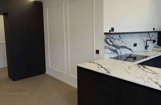 Wohnung kaufen in 80797 Maxvorstadt, Luxuriöse 3-Zimmer Dachgeschosswohnung in München Maxvorstadt