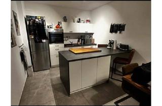 Wohnung kaufen in 35418 Buseck, Buseck - Moderne 2-Zimmer Wohnung mit Einbauküche Keller Tiefgarage