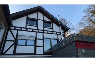 Wohnung kaufen in 51570 Windeck, Windeck - 5-Zimmer-Maisonette-Eigentumswohnung mit Garten und Carport