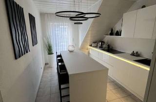 Wohnung kaufen in 41517 Grevenbroich, Vermietete Maisonette-Eigentumswohnung mit Balkon & Doppelgarage