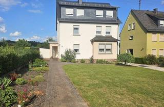 Einfamilienhaus kaufen in 55494 Rheinböllen, Rheinböllen - Charmantes Einfamilienhaus mit Garage auf weitläufigem, gepflegtem Garten-Grundstück