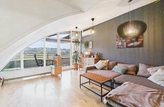 Wohnung kaufen in 66115 Saarbrücken, Außergewöhnliche Dachgeschosswohnung mit Loggia & Blick ins Grüne