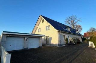 Haus kaufen in 29690 Schwarmstedt, Schwarmstedt - Charmantes Doppelhaus in zentraler Lage mit Garten