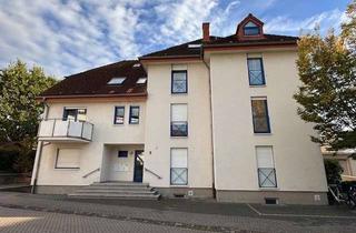Wohnung kaufen in 59590 Geseke, Attraktive Eigentumswohnung in der Innenstadt mit Westbalkon und Blick zum Teich