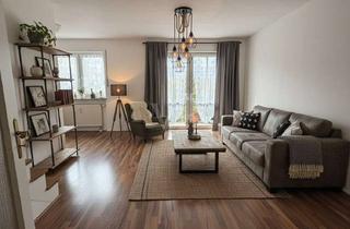 Wohnung kaufen in 01640 Coswig, VERMIETETE 2 RAUMWOHNUNG MIT TERRASSE UND TIEFGARAGENSTELLPATZ IN GUTER WOHNLAGE VON COSWIG