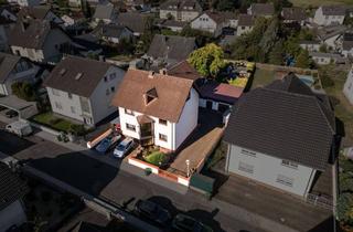 Mehrfamilienhaus kaufen in 64859 Eppertshausen, Top-Gepflegtes Mehrfamilienhaus mit Garage in Eppertshausen – Großes Grundstück, großes Potenzial