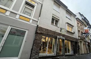 Anlageobjekt in 52249 Eschweiler, Dreifamilienhaus mit Ladenlokal im Erdgeschoss in zentrumsnaher Lage von Eschweiler