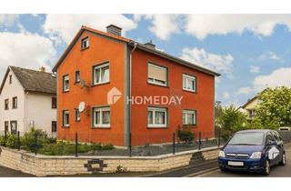 Haus kaufen in 61194 Niddatal, Niddatal - Attraktives MFH mit Garten und 3 Stellplätzen in ruhiger Wohngegend