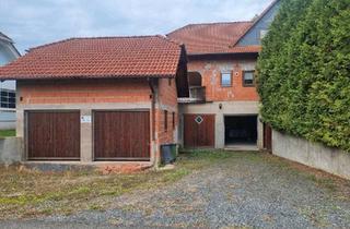 Haus kaufen in 35279 Neustadt, Neustadt (Hessen) - Zweifamilienhaus mit Garagen
