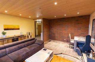 Wohnung kaufen in 46562 Voerde, Helle Räume, grüne Weite – Stilvolle Eigentumswohnung mit Balkon und Garage