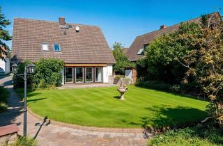 Einfamilienhaus kaufen in 40667 Meerbusch, Meerbusch: Einfamilienhaus mit Südgarten, Kamin, Garage & Einliegerwohnung