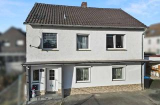 Einfamilienhaus kaufen in Detmolderstraße 109 a, 33175 Bad Lippspringe, Gepflegtes Einfamilienhaus mit drei Garagen in zentraler Lage von Bad Lippspringe