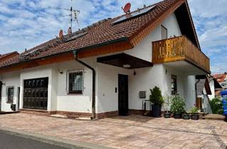 Wohnung kaufen in 63808 Haibach, Haibach - Maisonettewohnung mit Haus-im-Haus-Charakter