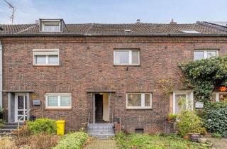 Reihenhaus kaufen in 40472 Düsseldorf, Düsseldorf - Charmantes Klinker-Reihenhaus mit Garten und überdachter Verandaterrasse