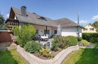 Einfamilienhaus kaufen in 61273 Wehrheim, Wehrheim - Modernisiertes Einfamilienhaus in zentraler Lage von Wehrheim mit viel Platz für Ihre Familie