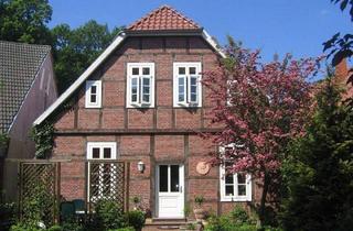 Haus kaufen in 49439 Steinfeld, Steinfeld - Idyllisches Zweifamilienhaus in zentraler Lage - denkmalgeschützt und vermietet!
