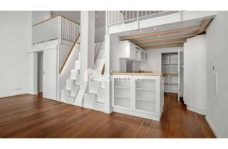 Wohnung kaufen in 23552 Innenstadt, Historischer Blickfang – Maisonette mit Sichtziegelwand