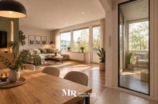 Wohnung kaufen in 31157 Sarstedt, Lichtdurchflutete 4-Zimmer-Wohnung mit Loggia und Blick ins Grüne