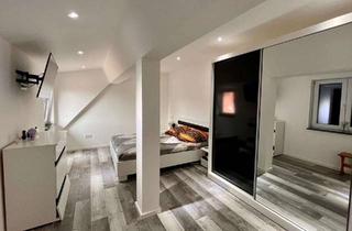 Haus kaufen in 97243 Bieberehren, Zweifamilienhaus mit saniertem Wohnbereich und Zukunftspotenzial auf großzügigem Areal