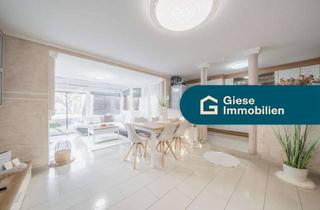 Wohnung kaufen in 70794 Filderstadt, Moderne Wohnung mit Garten und Wintergarten