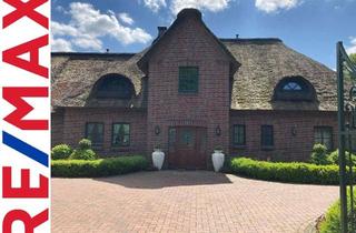 Villa kaufen in 47574 Goch, Luxuriöse Reetdachvilla am Niederrhein in Goch auf großem Grundstück