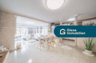 Wohnung kaufen in 70794 Filderstadt, Filderstadt - Moderne Wohnung mit Garten und Wintergarten