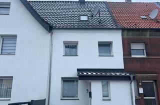 Reihenhaus kaufen in 59229 Ahlen, Ahlen - Rheinmittelhaus mit Garten im Ahlener Süden