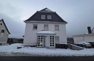 Haus kaufen in 35753 Greifenstein, Freistehendes Wohnhaus mit Anbau und Garage in Greifenstein-Nenderoth