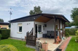 Haus kaufen in 18573 Gustrowerhöfen, Charmanter Bungalow in Gustow mit eigenem Garten und überdachter Terrasse