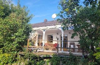 Einfamilienhaus kaufen in 84164 Moosthenning, Moosthenning - Einfamilienhaus mit großen Gartengrundstück zu verkaufen.