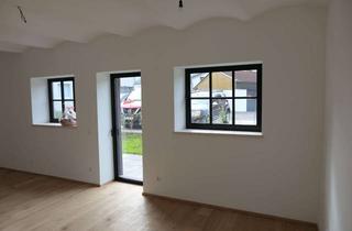 Wohnung mieten in Auenstraße, 83395 Freilassing, Stilvolle 2-Zimmer-Terrassenwohnung mit großem Garten und hochwertiger Einbauküche