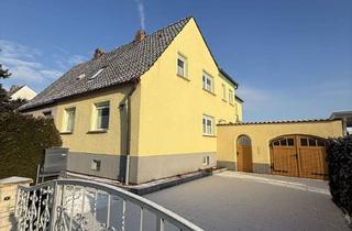 Doppelhaushälfte kaufen in 99625 Kölleda, Gepflegte Doppelhaushälfte mit großem Grundstück, Garage und vielseitigem Nebengebäude in Kölleda