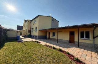 Doppelhaushälfte kaufen in 99625 Kölleda, Gepflegte Doppelhaushälfte mit großem Grundstück, Garage und vielseitigem Nebengebäude in Kölleda