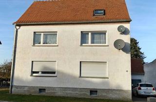 Haus kaufen in Bahnhofstraße 70, 35510 Butzbach, Haus in Feldrandlage in Kirch-Göns