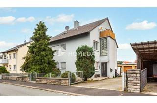 Einfamilienhaus kaufen in 97295 Waldbrunn, Vielseitiges Einfamilienhaus mit zwei Wohneinheiten, Garagen und Nebengebäude in ruhiger Lage