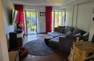 Wohnung kaufen in 59227 Ahlen, Ahlen - EG- Wohnung mit Garage und Garten