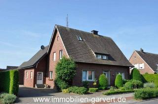 Haus kaufen in 46354 Südlohn, Südlohn - Zweifamilienhaus mit Garage, Balkon und Teilkeller in ruhiger Lage von Südlohn