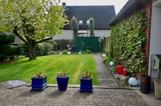 Haus kaufen in 22946 Grande, Charmantes Rotklinkerhaus mit Einliegerwohnung und großem Garten