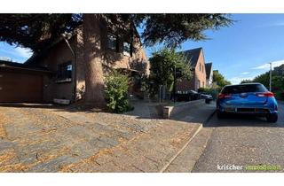 Einfamilienhaus kaufen in 41564 Kaarst, Freistehendes Einfamilienhaus im Dornröschenschlaf in ruhiger familienfreundlicher Lage zu kaufen!