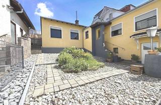 Haus kaufen in 63549 Ronneburg, Wohnen auf einer Ebene – gepflegter Bungalow mit Kamin, Klima & Urlaubs-Garten