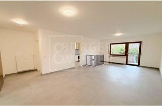 Wohnung kaufen in 68723 Oftersheim, Moderne 3-ZKB-Maisonette-Wohnung mit Garten, Einbauküche & 2 KFZ-Stellplätzen