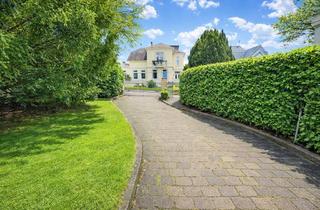 Wohnung kaufen in 21029 Bergedorf, Direkt im Villenviertel: 3-Zimmer-Luxus-Eigentumswohnung mit eigenem Garten - vermietet