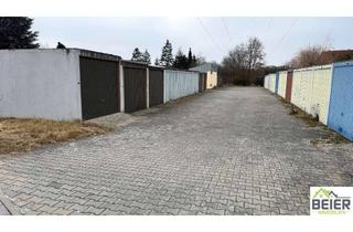 Garagen kaufen in 90530 Wendelstein, Zwei Einzelgaragen mit Verbindungsdurchgang auf geplegtem Garagenhof