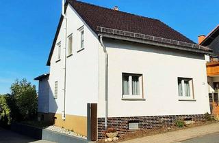 Einfamilienhaus kaufen in 65510 Hünstetten, Charmantes Einfamilienhaus mit großem Garten in Hünstetten