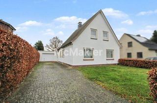 Einfamilienhaus kaufen in 25364 Brande-Hörnerkirchen, Gestaltbares EFH mit Wintergarten, großer Garage und Feldrandlage in Brande-Hörnerkirchen